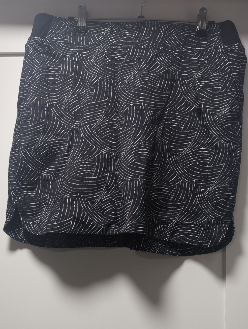Black Tennis Skirt with White Swirl Dot Pattern